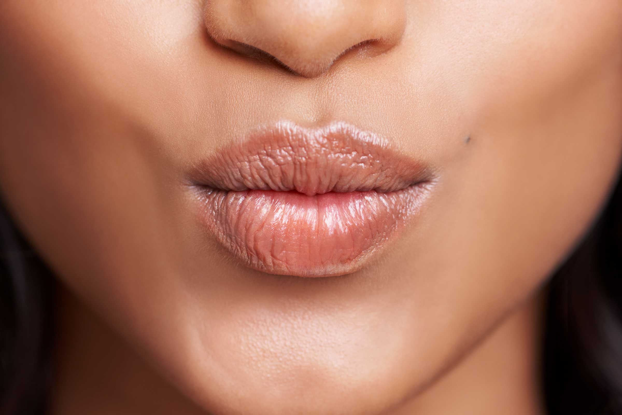 08-Amazing-Uses-of-Argan-Oil-For-Health-And-Beauty_lips_524861023_PeopleImages